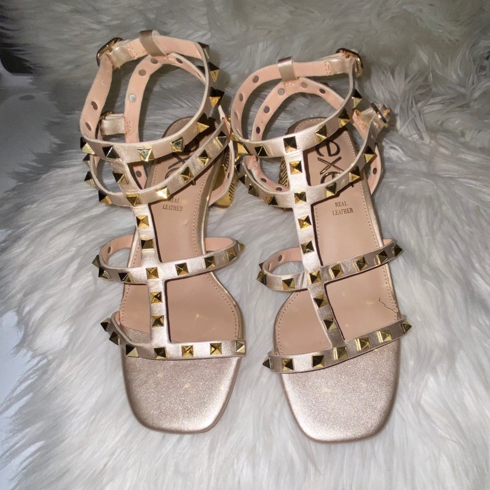 Exé Gold studded heels
